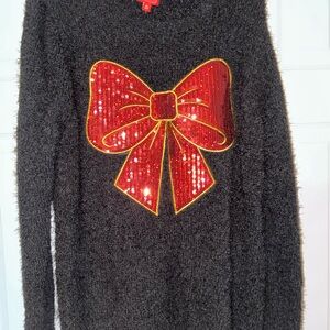Elegant Black Sweater with Red Sequin Bow